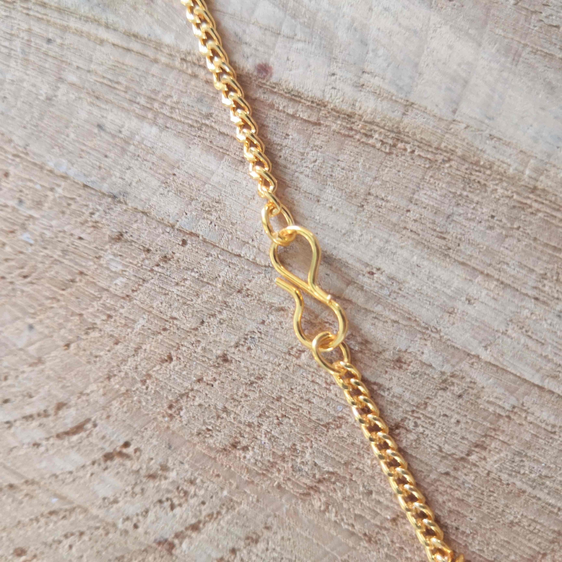 Cage en pendentif pour pierre roulée
